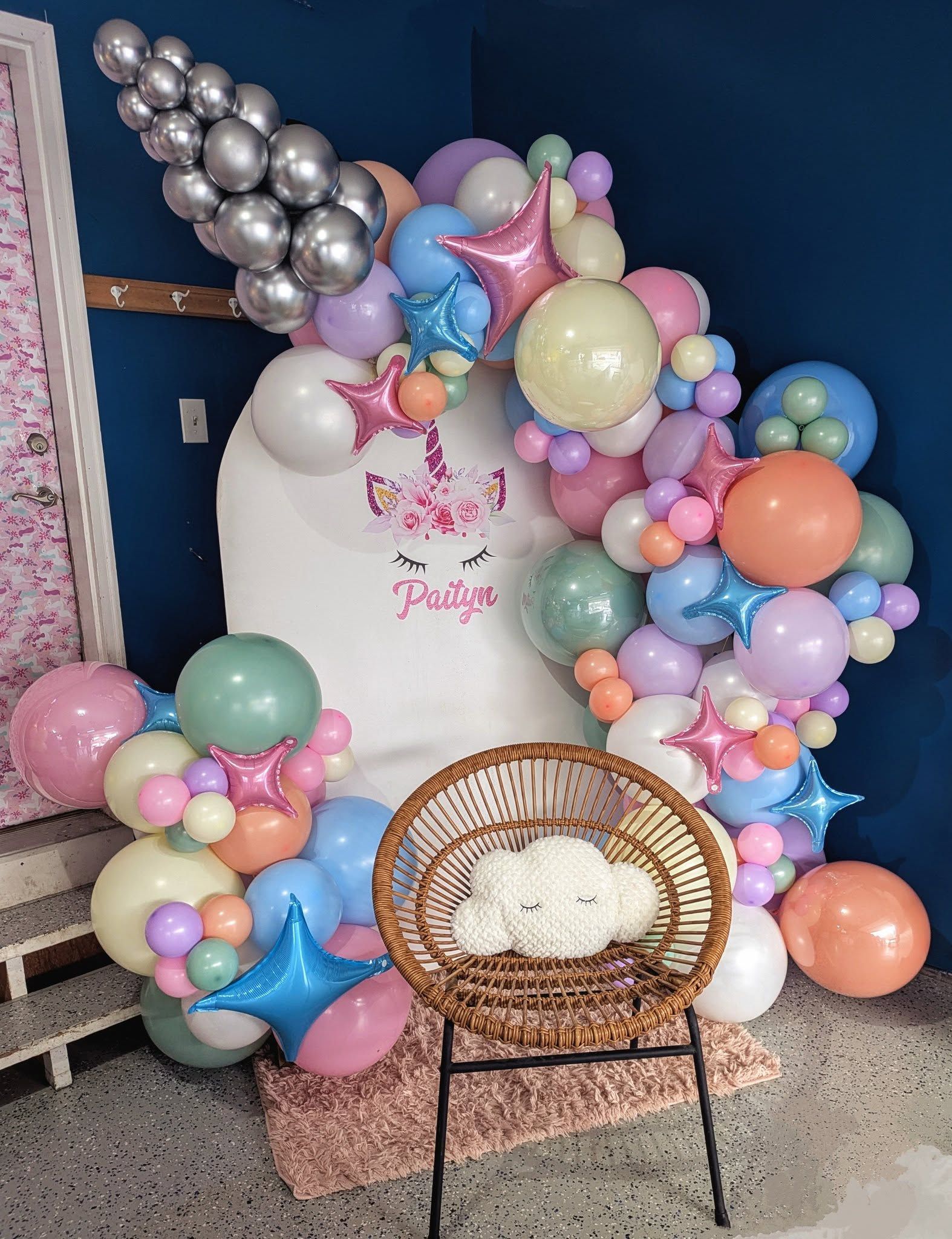 A colorful unicorn-themed party setup 