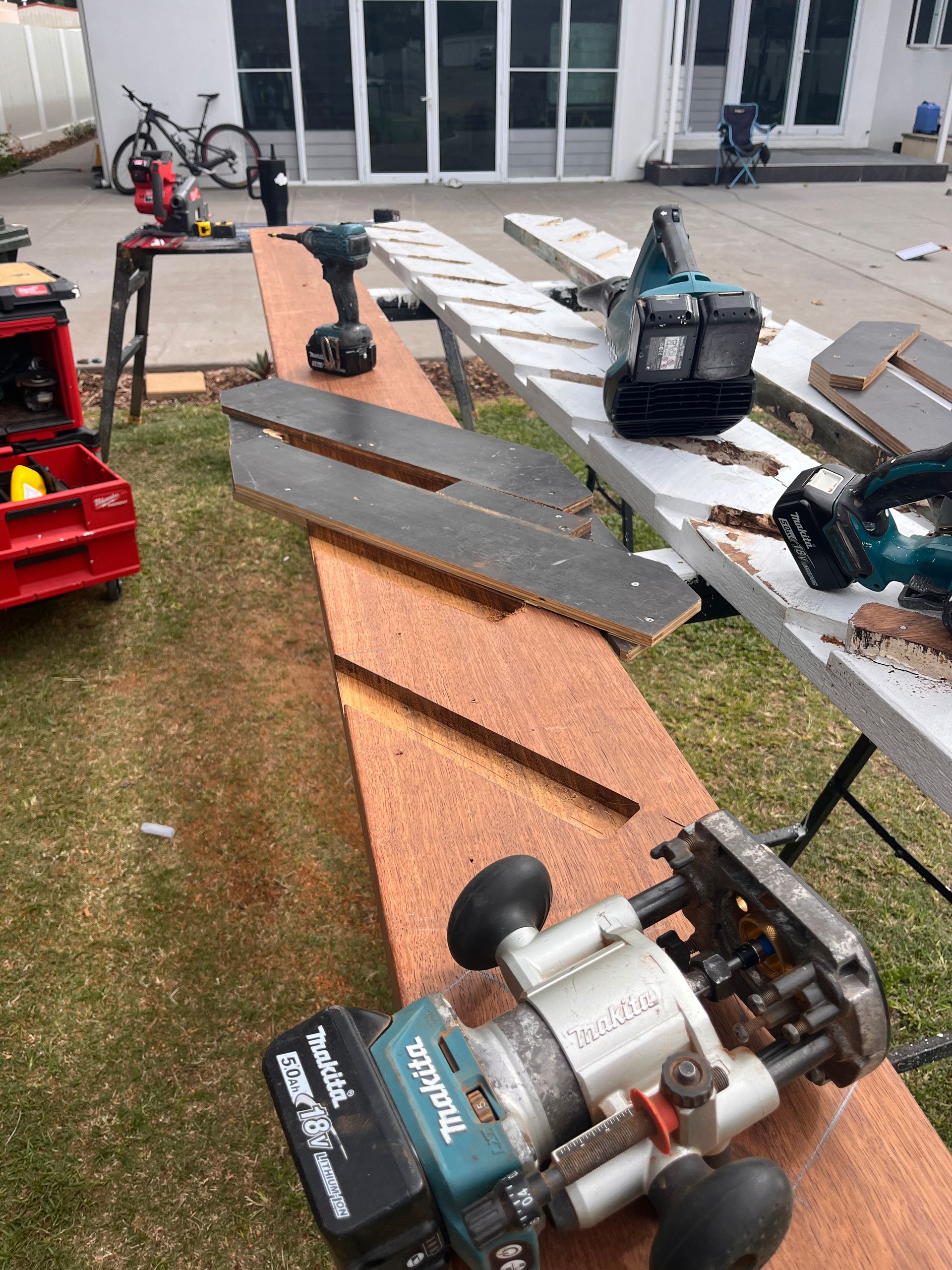 An Empty Room With Stairs Leading Up to the Second Floor — Shaun Steenson Building Services in Townsville, QLD