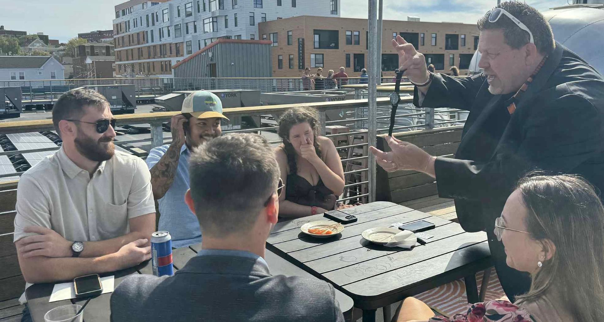 A man is giving a piece of cake to a woman.