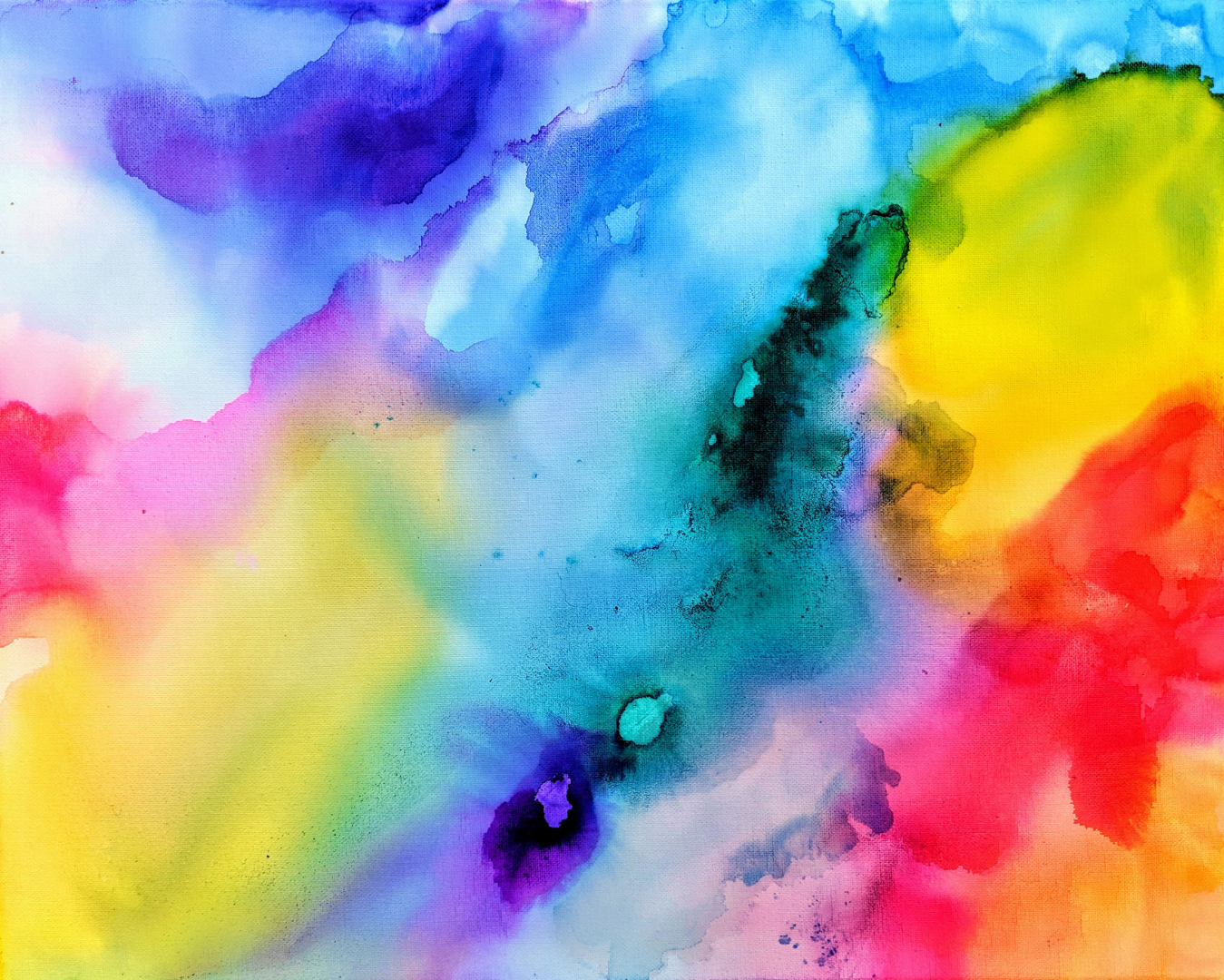Abstract watercolor painting with vibrant colors blending: yellow, blue, purple, pink, and red.
