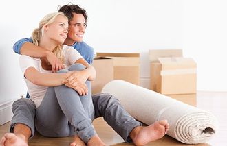 bay removals couple sitting on the floor