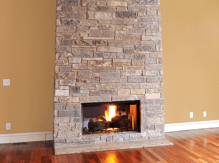 fireplace refinished with stone veneer