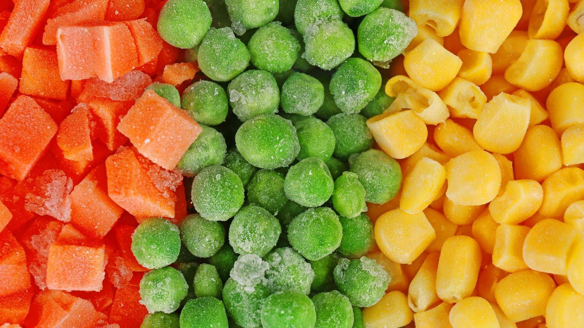 There are three different types of frozen vegetables , carrots , peas , and corn.