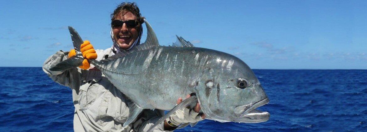 Man With Gigantic Fish — dean jackson guided tours in Winnellie, NT