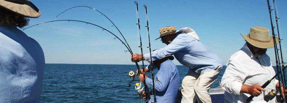 Men Fishing — dean jackson guided tours in Winnellie, NT