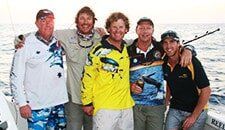Group of people in fishing boat — darwin fishing tours in Winnellie, NT