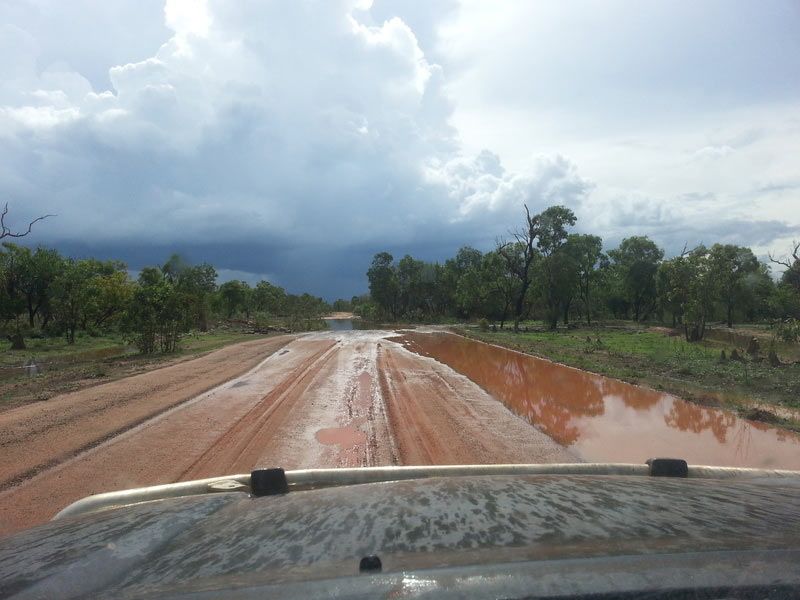 Wet road — Dean Jackson Guided Tours in Winnellie, NT