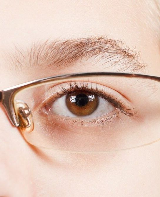 A Close Up of a Woman's Eye Wearing Glasses — Ian Emslie Optometrist In Warners Bay, NSW