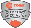 A trane comfort specialist logo with a house on it