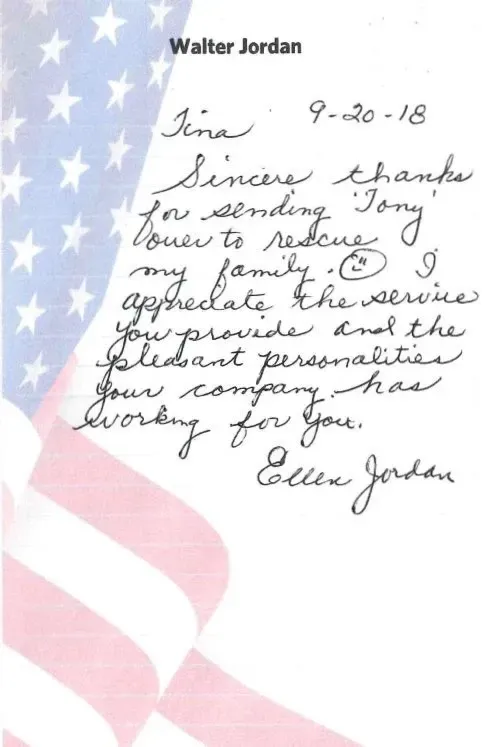 Handwritten thank you note on patriotic background.