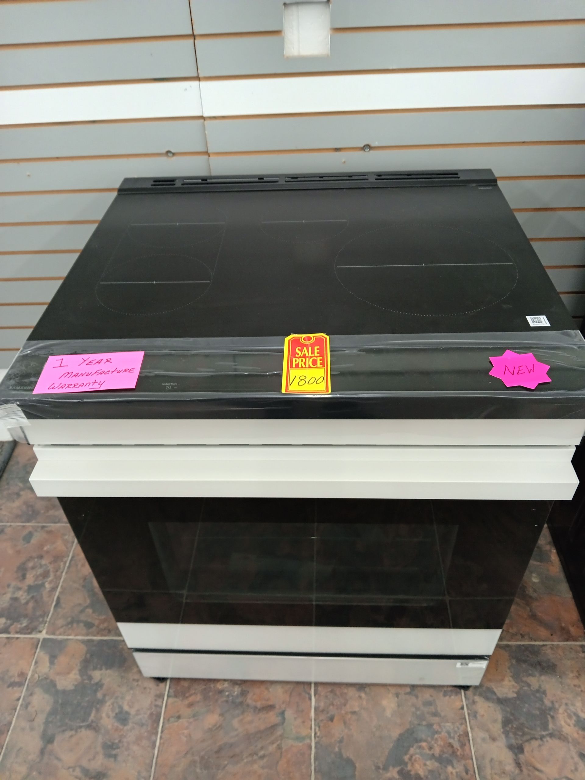 NEW Samsung Induction Slide in Glass Top  Electric Stove; 1 year manufacture warranty; $1800.00, in Battle Creek