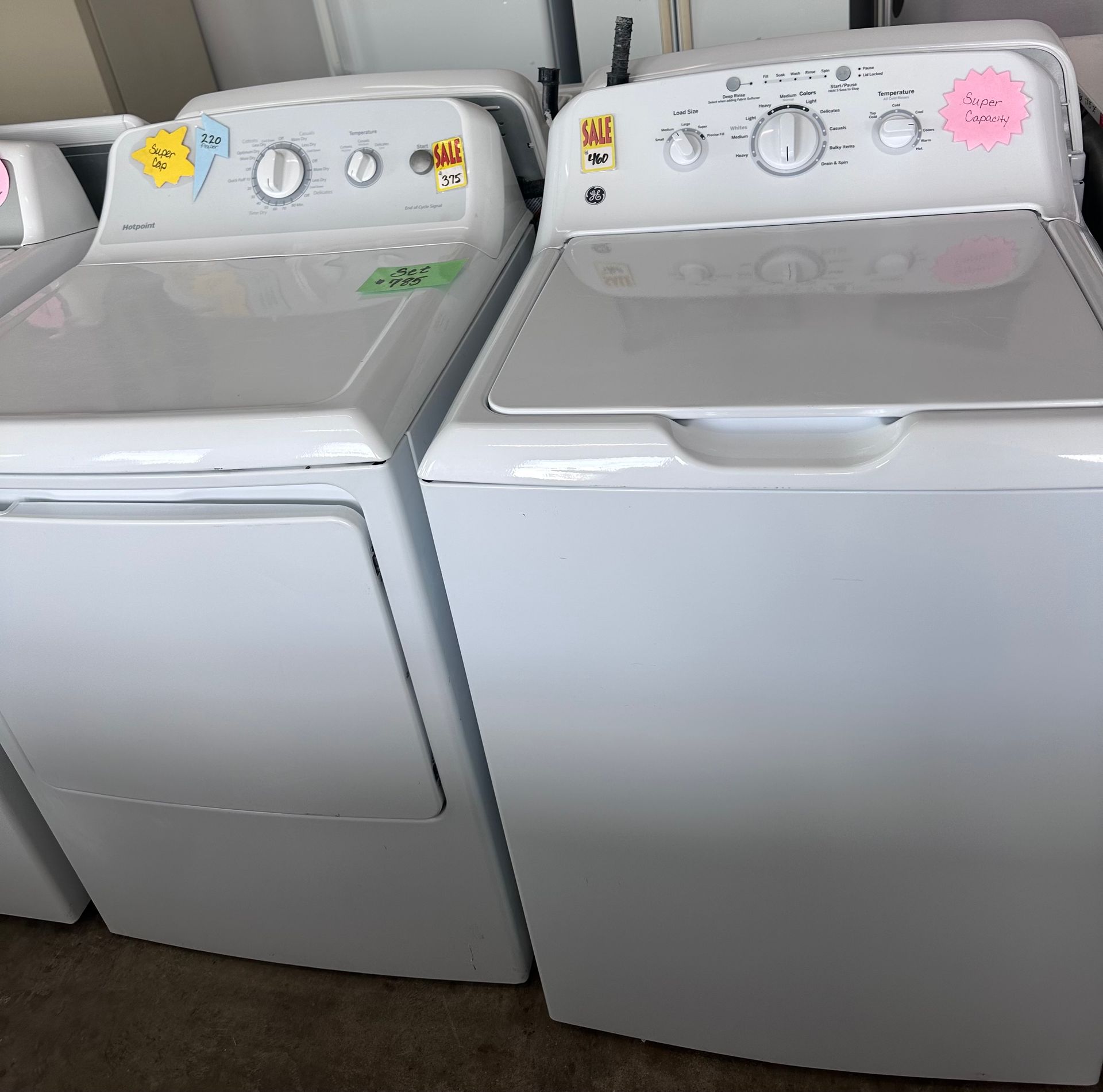 A washer sitting next to each other