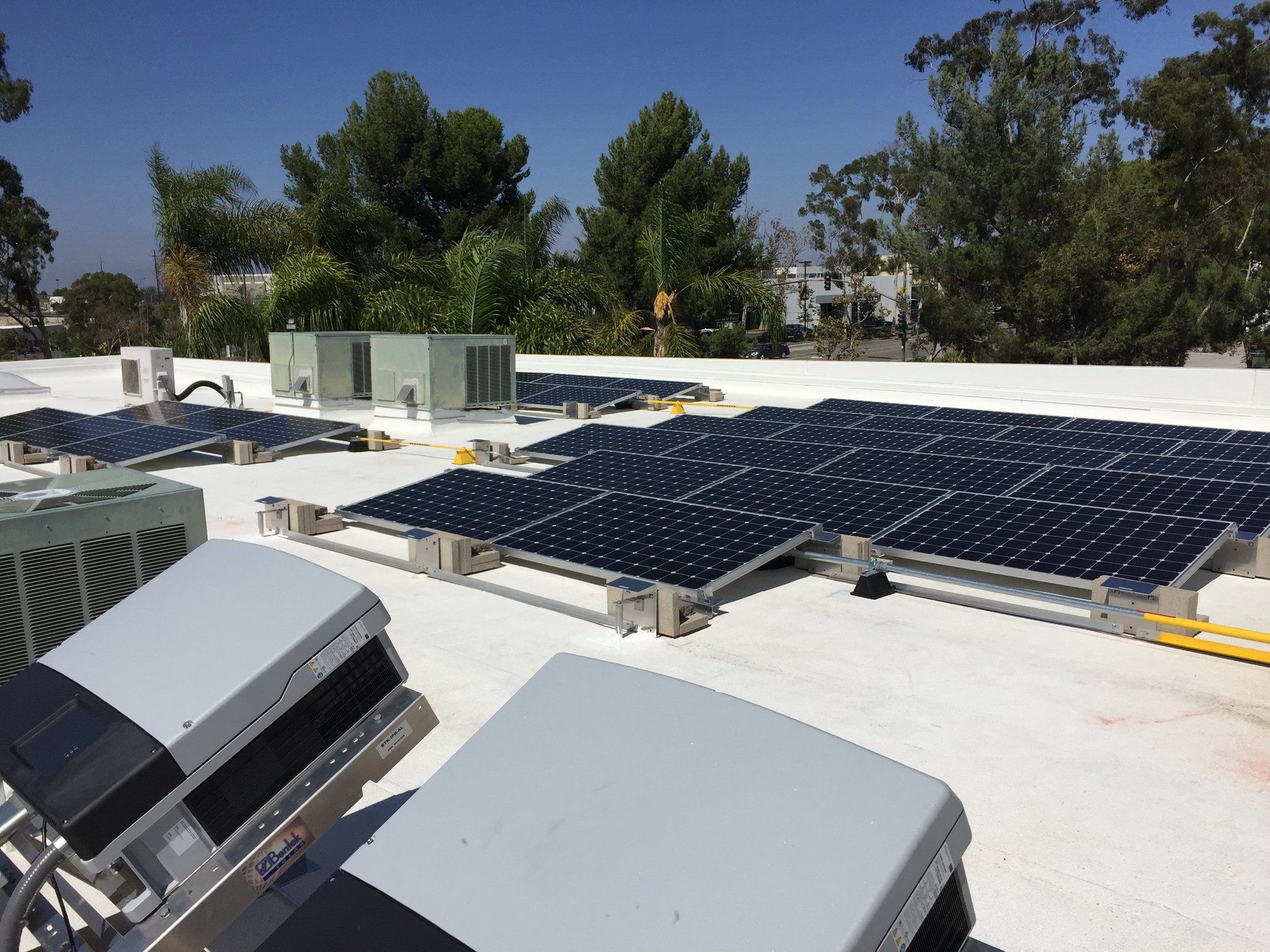 A roof with a lot of solar panels on it