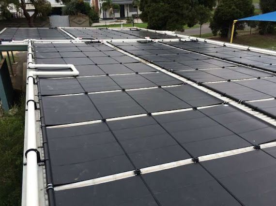 A roof with a lot of solar panels on it
