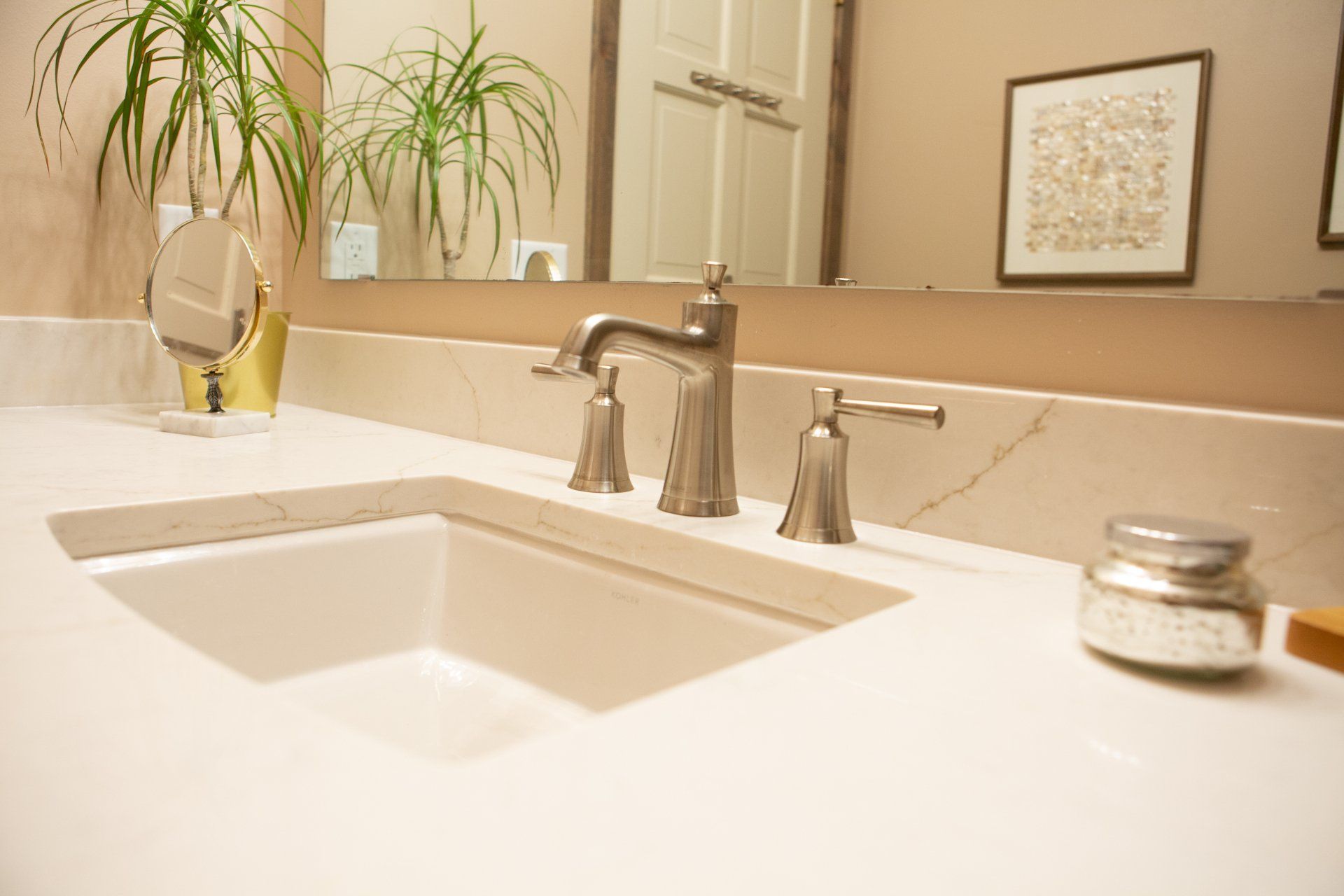 white countertop with beautiful sink