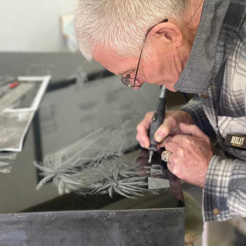 Man Doing Hand-Etched Monument — Mount Ayr, IA — Eighmy Friedrich Monument Co