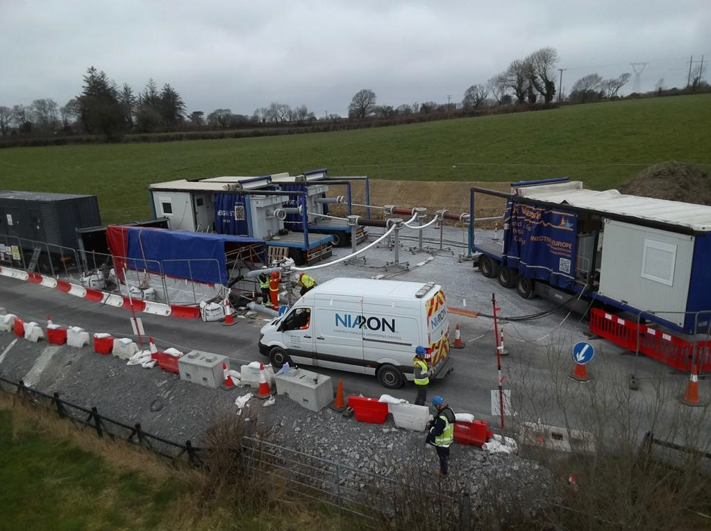 A nixon van is parked on the side of the road