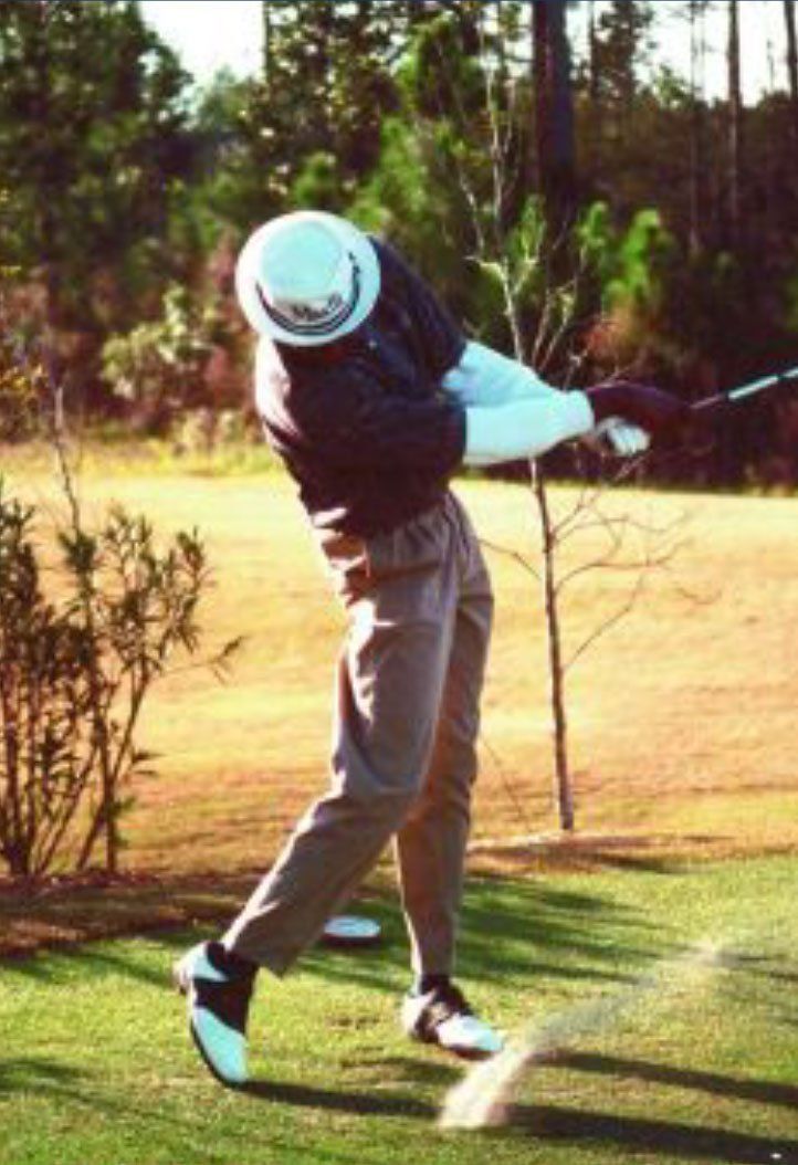 Wyman Frederick Golfing Swing