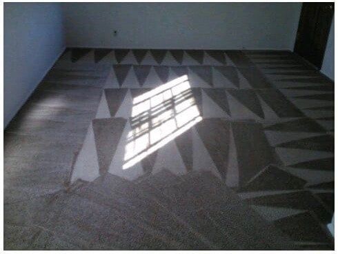 A room with a geometric pattern on the floor