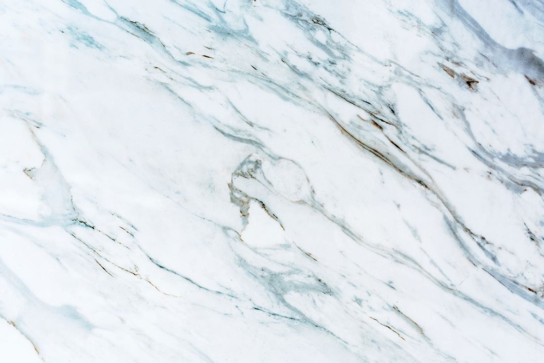 A close up of a white marble texture.