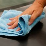 hand cleaning with a microfiber towel