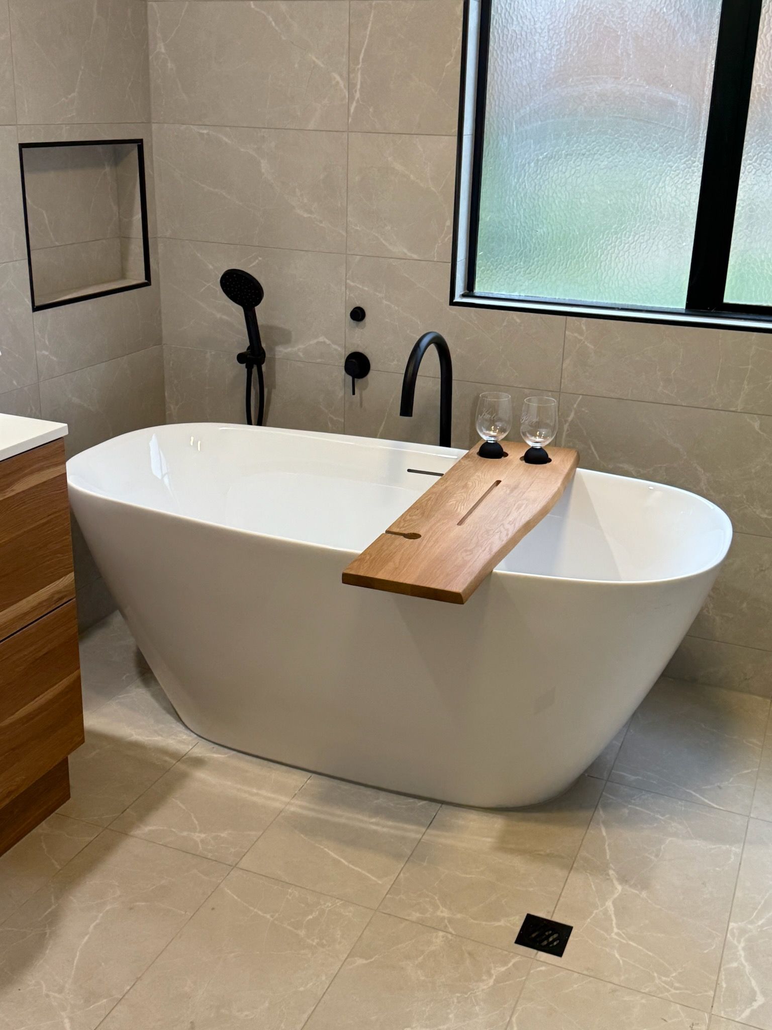 A Clean, U-shaped Kitchen With White Cabinets — Lenny's Plumbing & Contracting in Granton, TAS