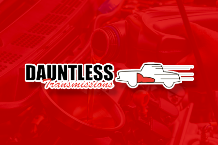 Dauntless Transmissions logo with red background; white pickup truck silhouette, red fluid effect.