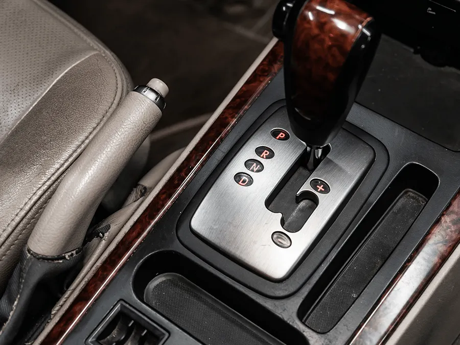 A close up of a shifter in a car