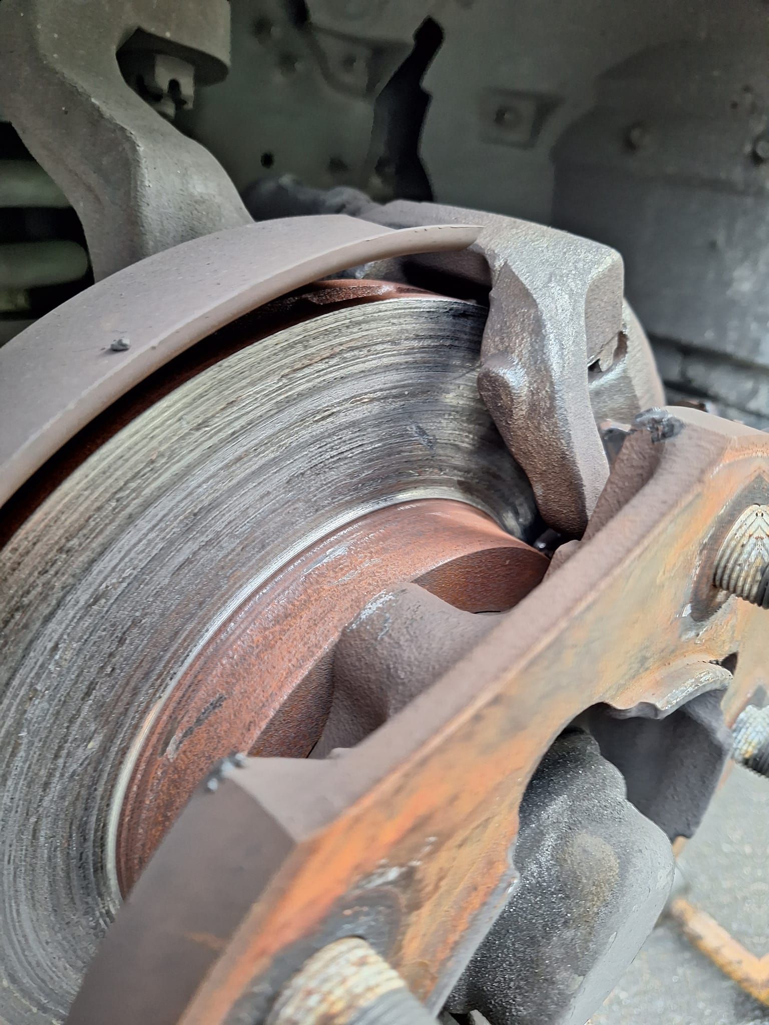 A Close Up of a Brake Disc on a Car — PT AUTO In Cardiff, NSW