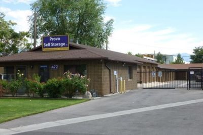 A brick building with a sign that says ' provo self storage ' on it