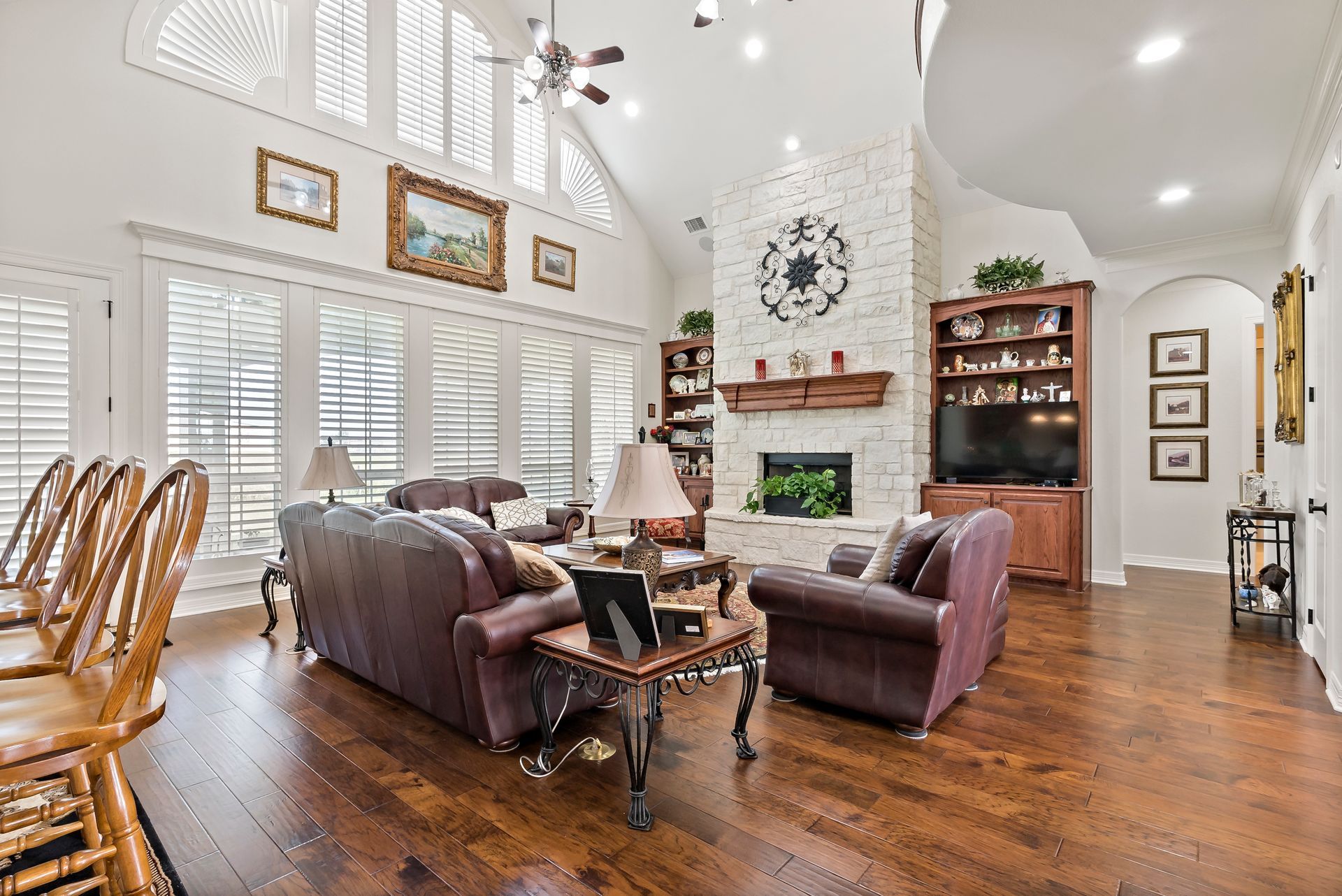 A living room filled with furniture and a fireplace.