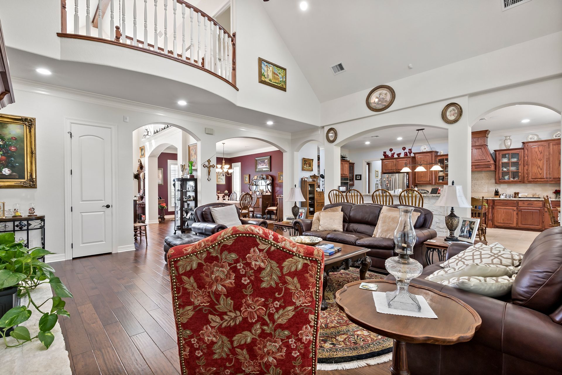 A living room filled with furniture and a balcony.