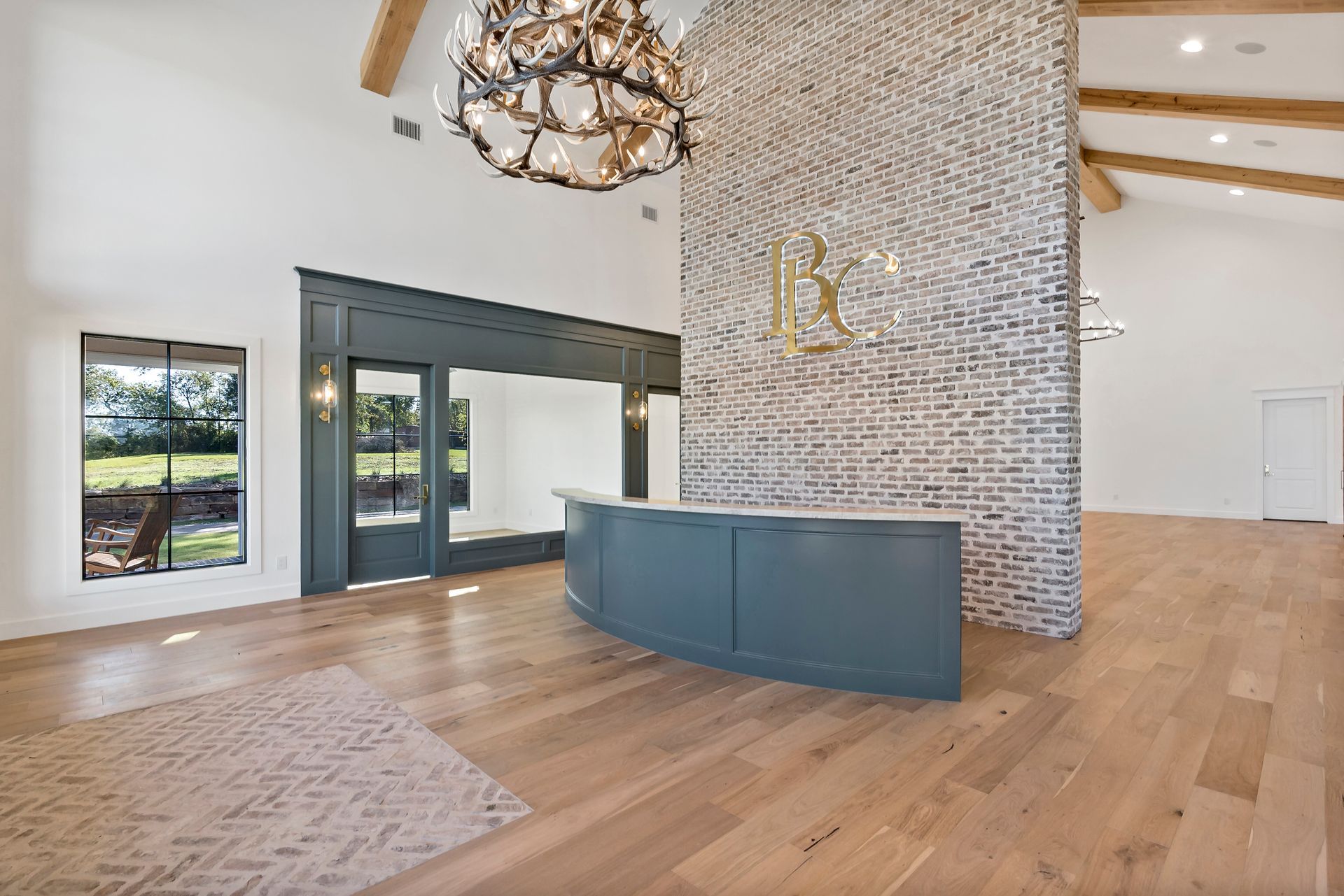 There is a large brick wall in the middle of the room.