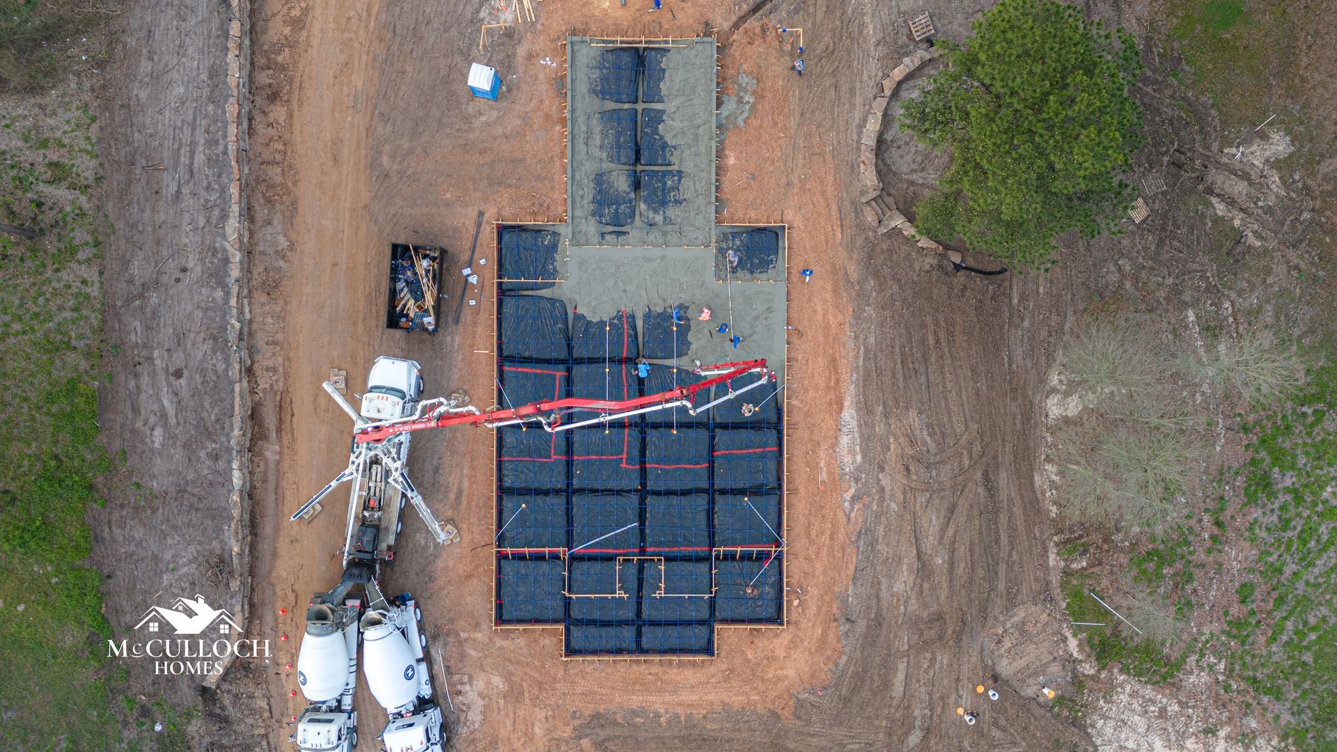 An aerial view of a building under construction.