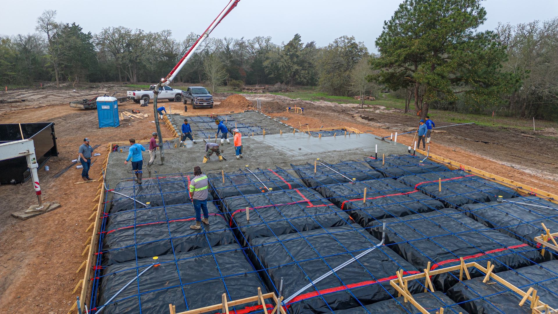 A group of people are working on a construction site.