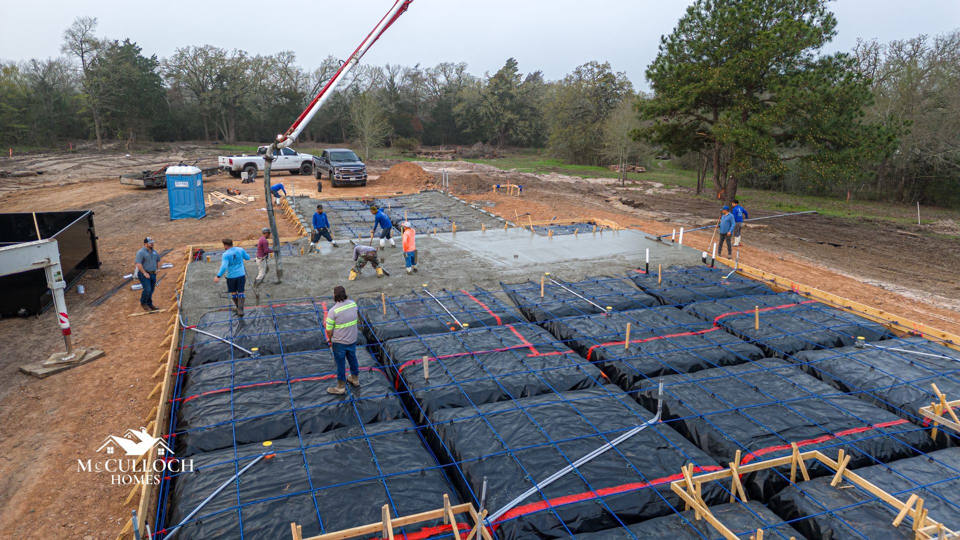 A group of people are working on a construction site.