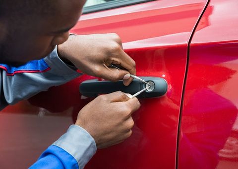 Man Unlocking The Car Door — Claremont, NH — Curt’s Lockout Service LLC