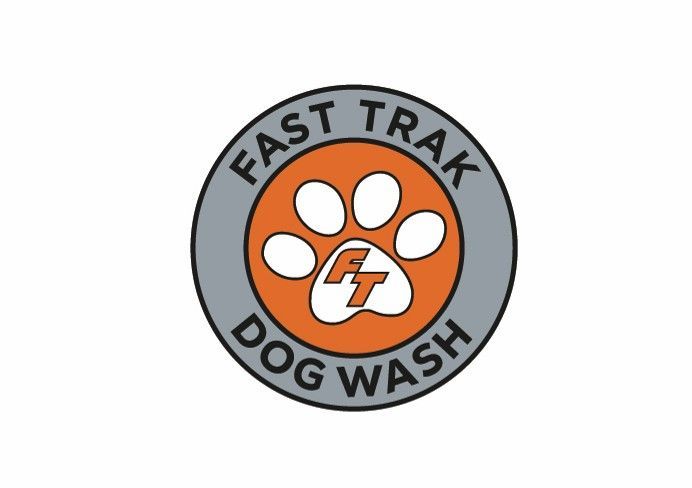 The logo for fast trak car wash is orange and gray.