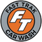 The logo for fast trak car wash is orange and gray.