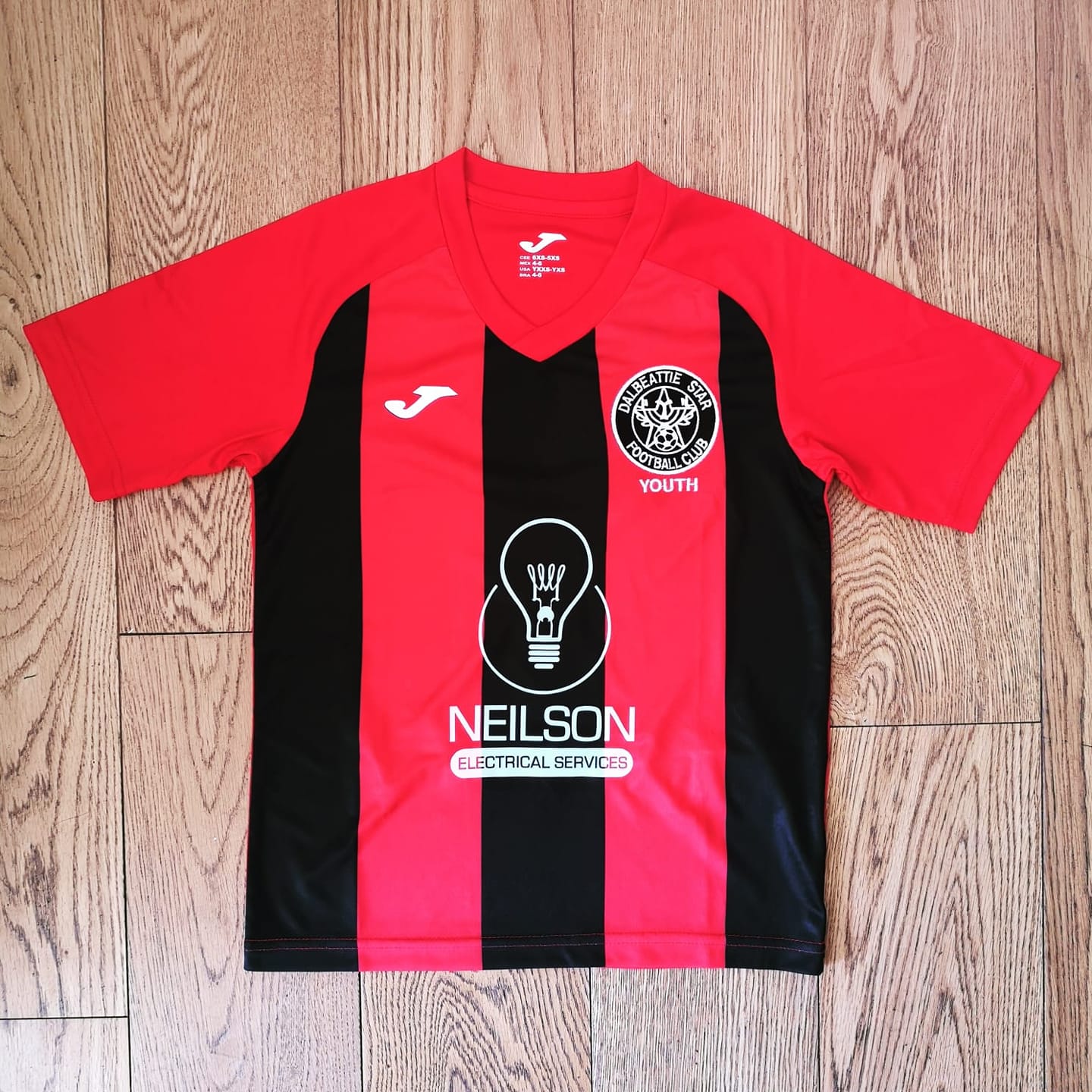 Dalbeattie Star Youth Football Club team strip sponsored by Neison Electrical Services