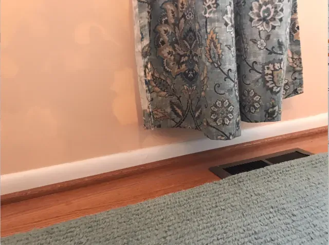 Mistake 1: Hanging Curtains Too Low or Too Short