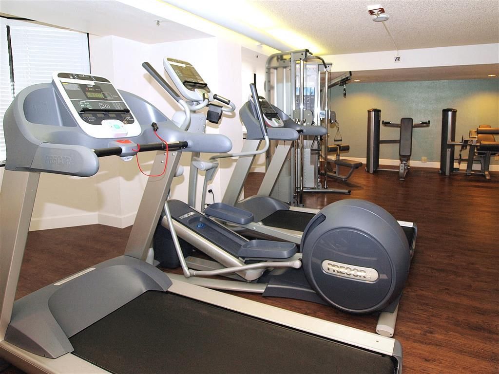 Community gym with treadmills and cardio equipment.