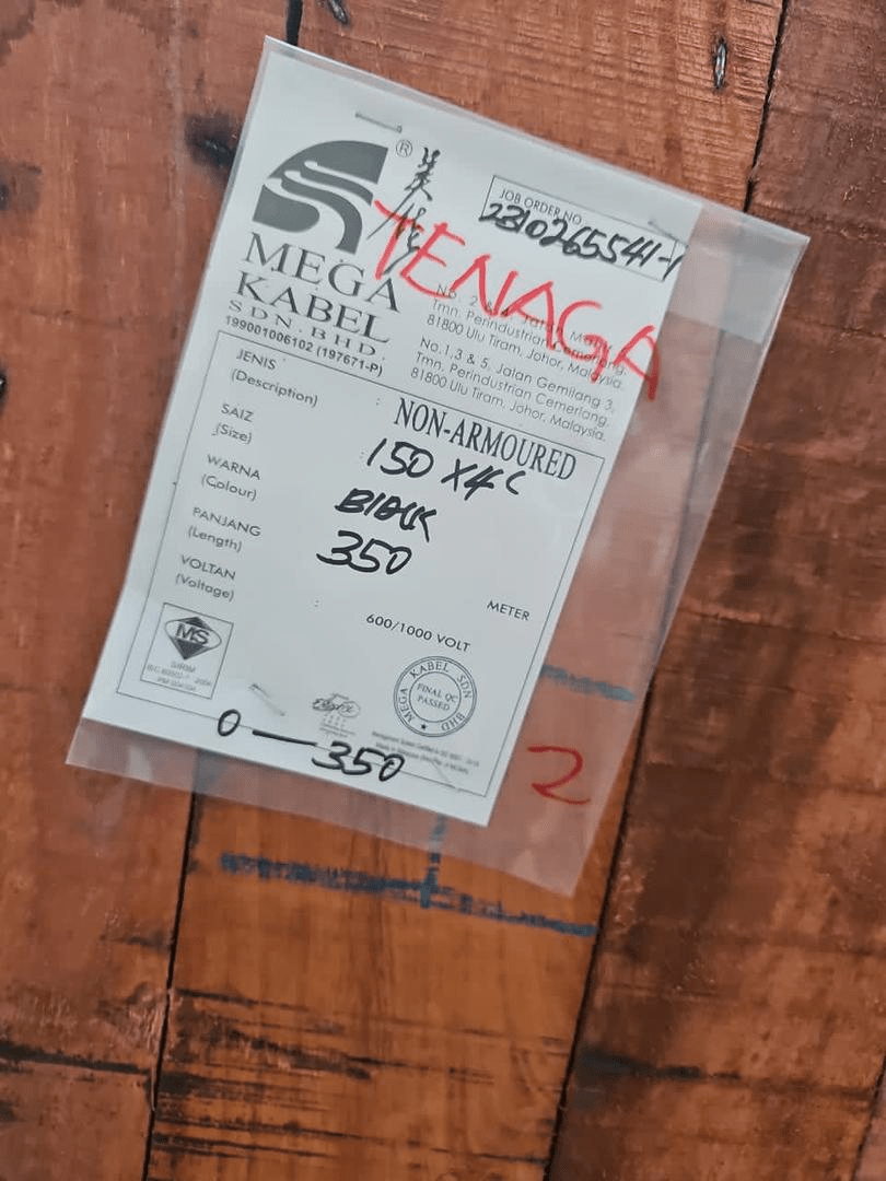 Label in a clear plastic bag on a wooden surface. Contains product information, including 