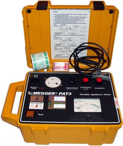 Yellow portable appliance tester with open case, Megger PAT3, testing equipment.