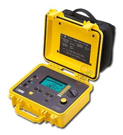 Yellow and black testing device in an open case, with a digital display showing 