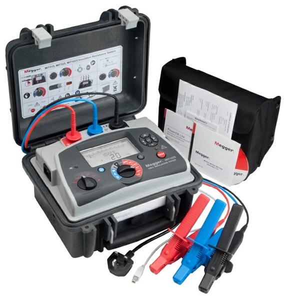 A Megger MIT420 insulation tester in a case, with probes, and a manual.