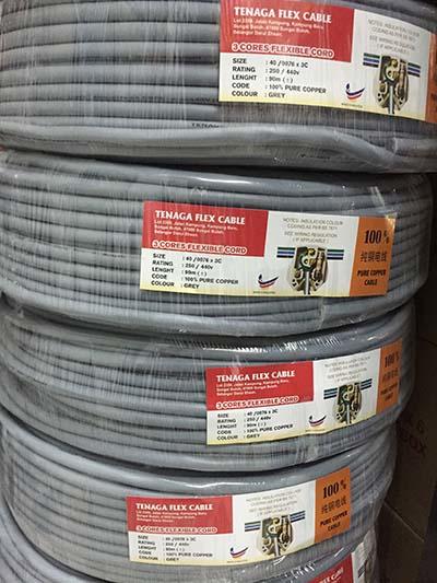 Gray electrical cables stacked, labeled with 