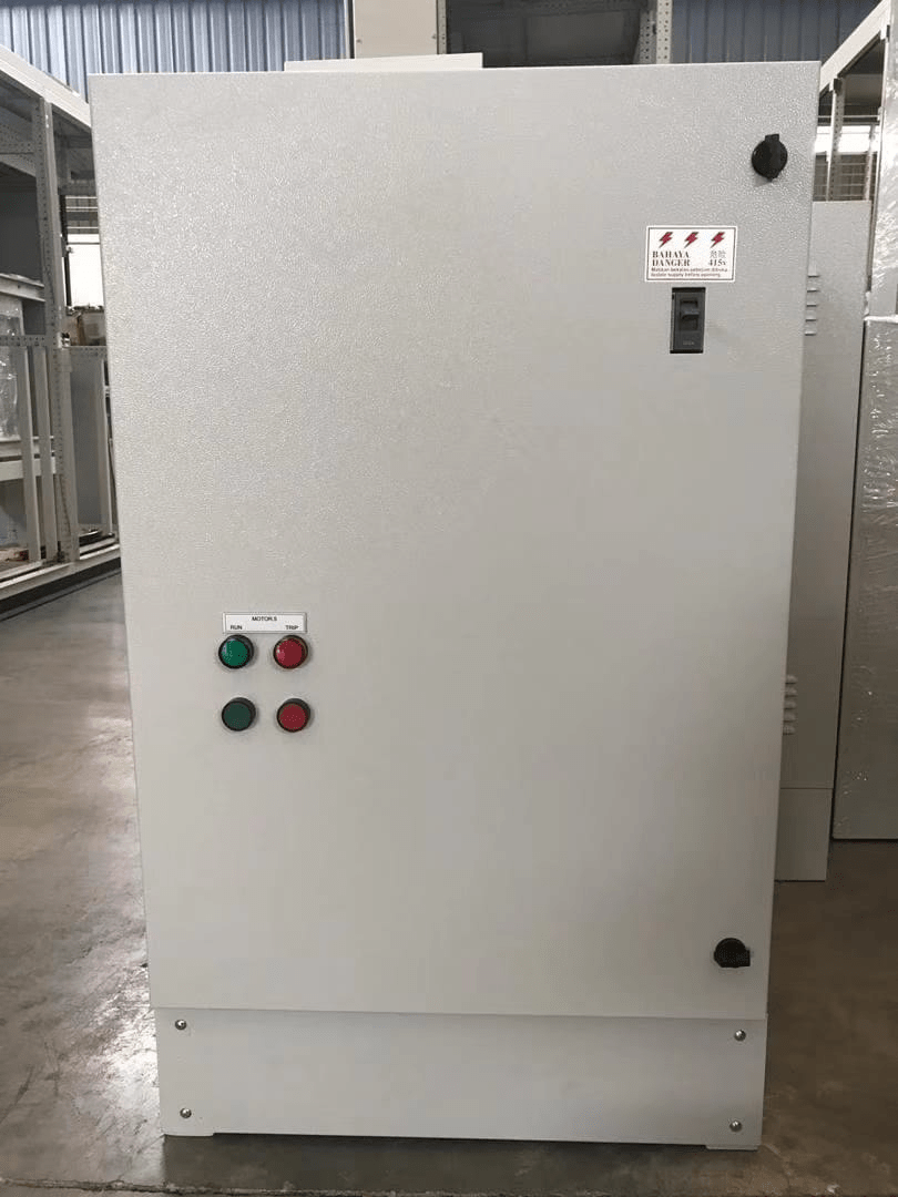 Gray electrical cabinet with green and red buttons, and a power switch.