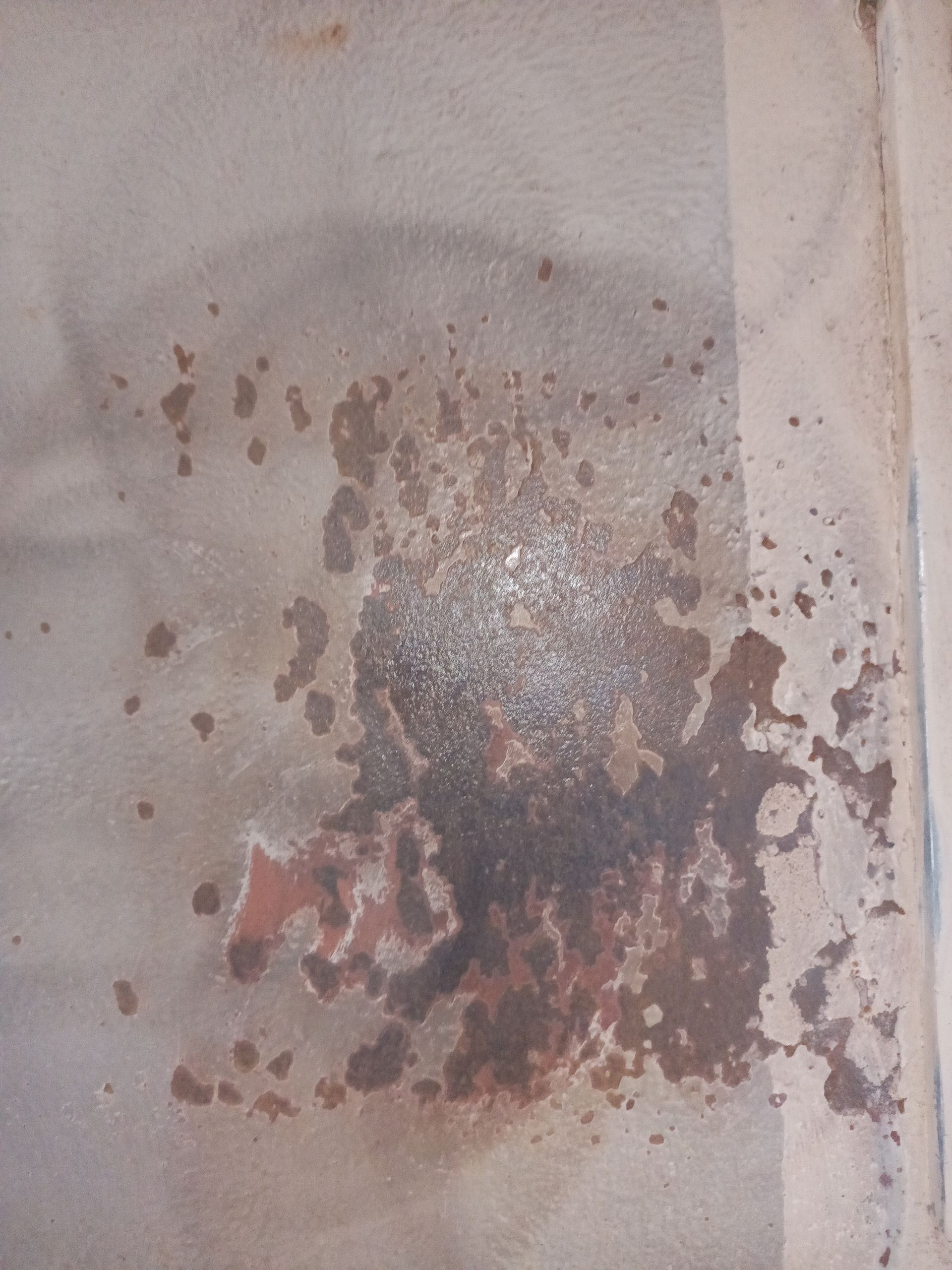 Rust-damaged metal surface before industrial painting and coating