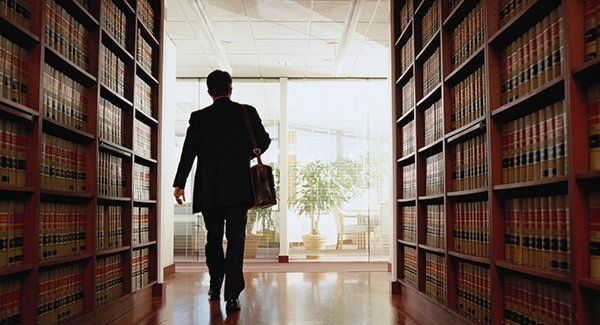 Lawyer Exiting in Library - Lawyer in Jacksonville, NC